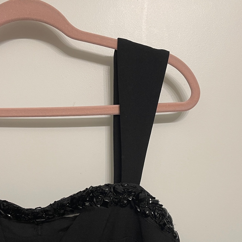 Elegant Black Dress from Taylor, with Embellished Neckline